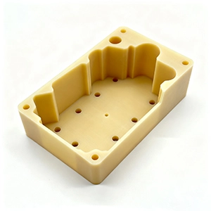 Delrin CNC machined bushing with reamed bore for smooth rotation