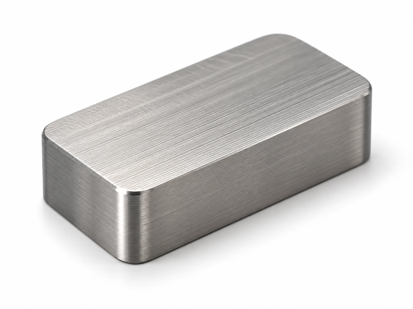 As-machined titanium sample with visible CNC machining marks