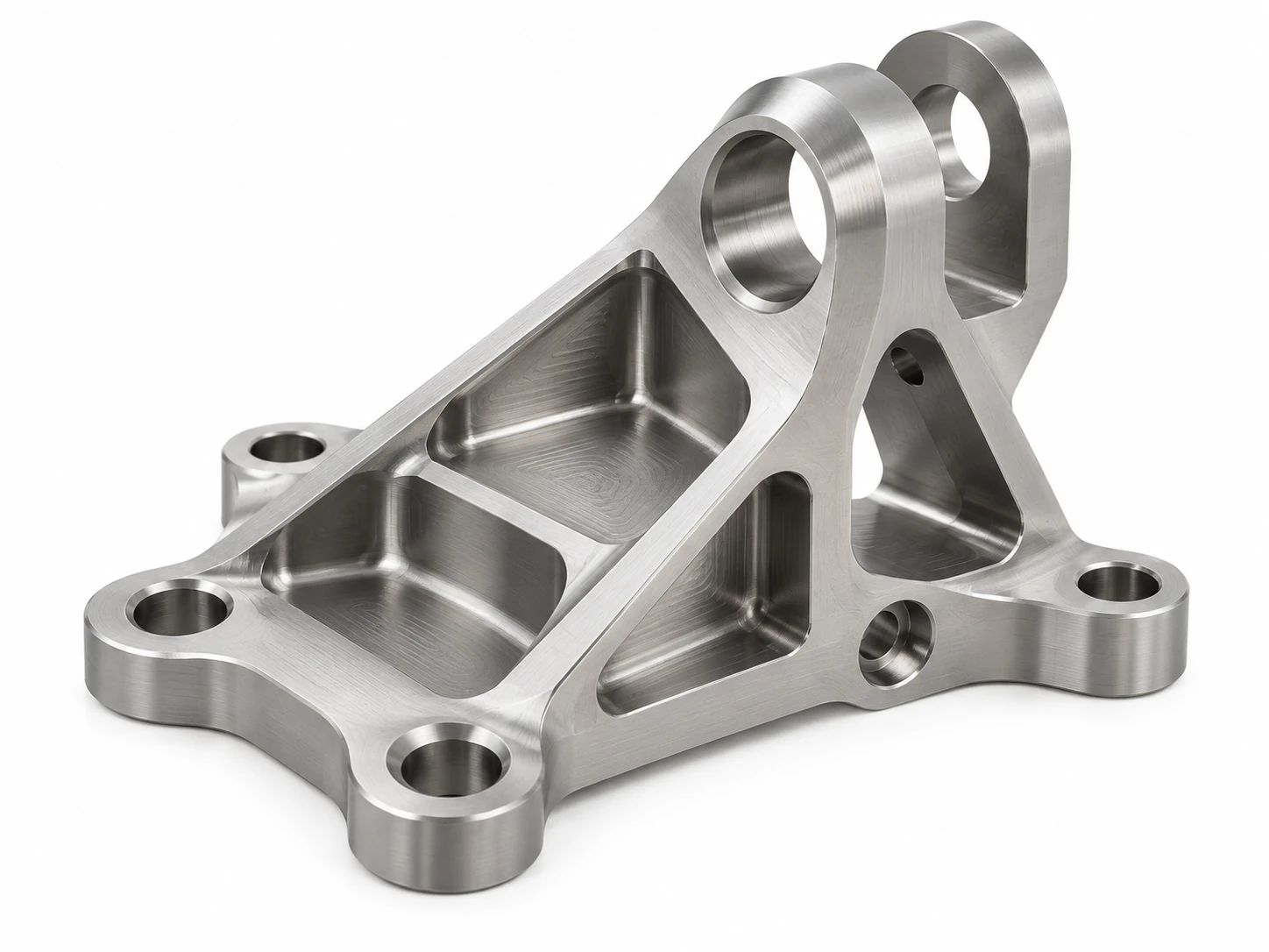 CNC machined titanium bracket with precision mounting holes and milled pockets