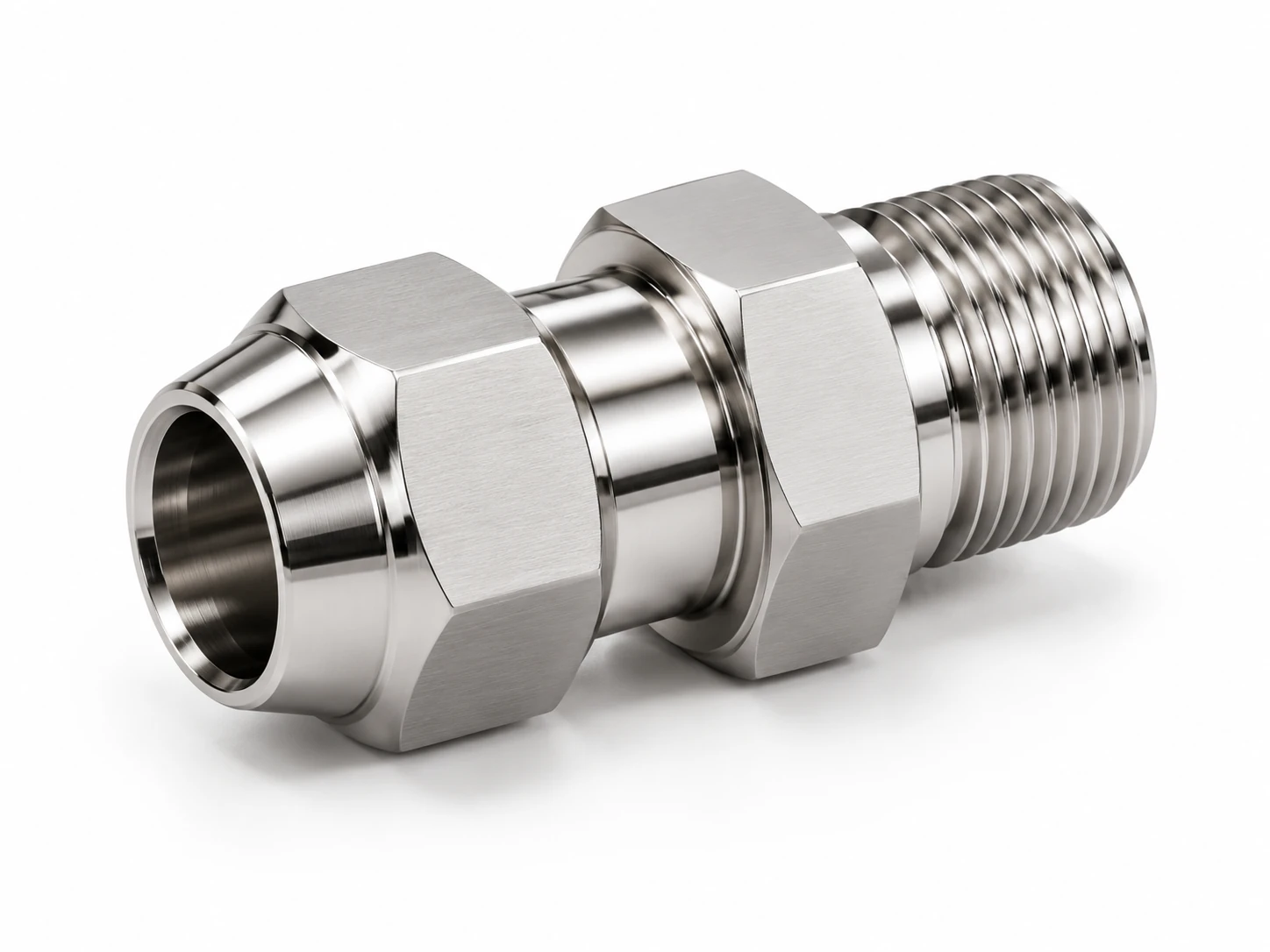 Precision nickel alloy fitting with smooth bright metallic surface representing electropolishing